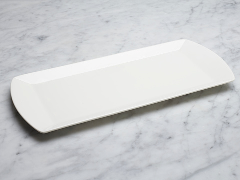 White Plate on Marble Table