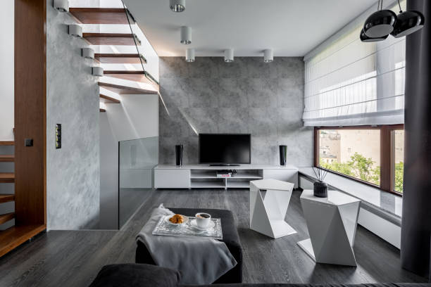 istock Tv living room with staircase 864429578