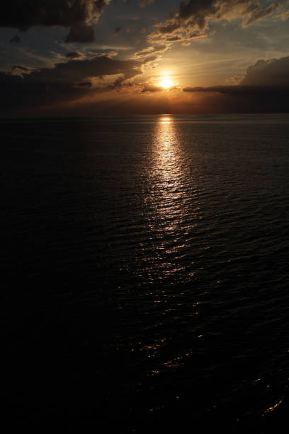istock Beautiful sunset over ocean 864429812