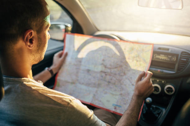 istock Man traveling by car. Navigation concept. 864430820