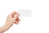 Isolated female hand holds white card on a white background.