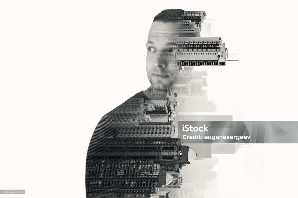 Young European man and modern cityscape Double exposure concept collage. Young European man and modern cityscape over white background, black and white photo Multiple Exposure Stock Photo