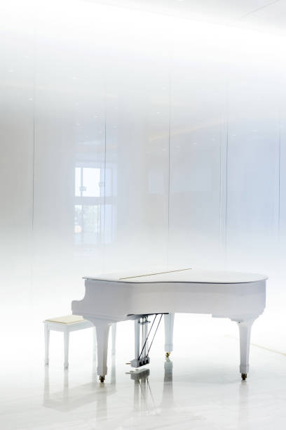 Grand white piano in white interior, Greece Grand white piano in white interior, Greece. grand piano stock pictures, royalty-free photos & images