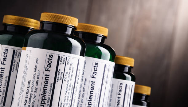 istock Composition with dietary supplement containers. Drug pills 864435972