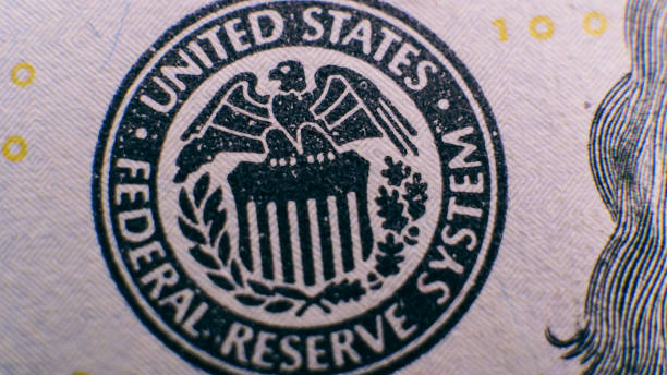 istock a close-up part of a hundred dollars. 100 dollars in details, counterfeiting with dollar notes 864438340