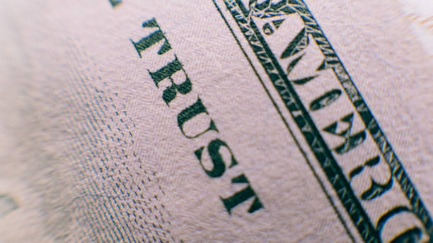 istock a close-up part of a hundred dollars. 100 dollars in details, 
counterfeiting with dollar notes 864438420