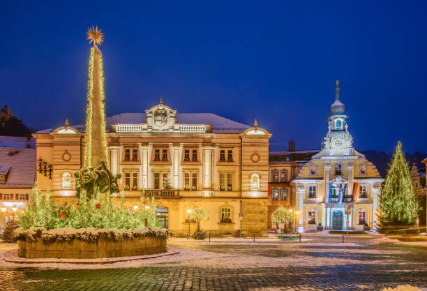 istock Christmas illuminated medieval town square in Kulmbach 864439770