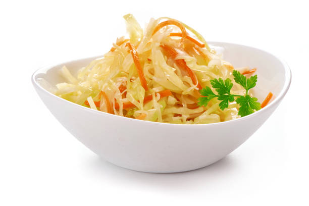 istock Cabbage salad with carrots, in white bowl 864439842