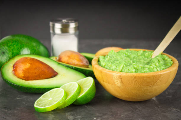 istock avocado Guacamole on molcajete real Mexican traditional procedur 864440054