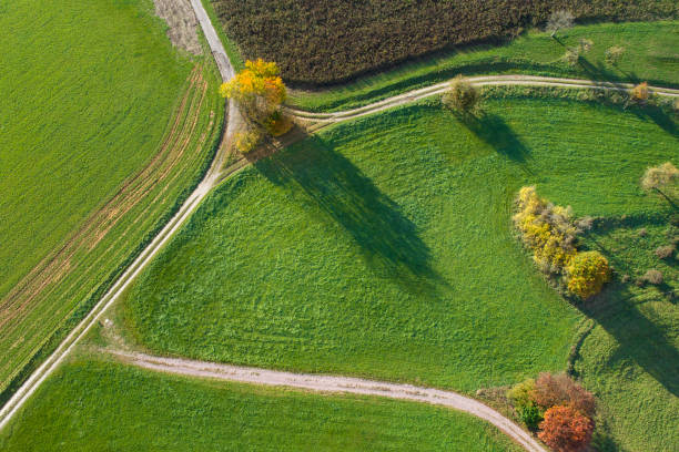 Autumnal landscape - aerial view Autumnal landscape and fields - aerial view autumn field tree mountain stock pictures, royalty-free photos & images