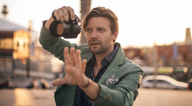 istock Photographer taking pictures 864450540