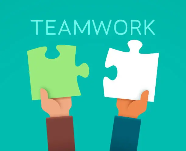 Vector illustration of Teamwork Puzzle Piece Hands