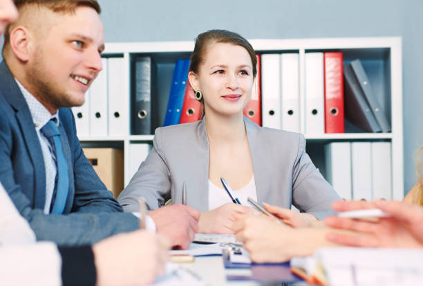 istock Modern lawyers discussing working problems. Serious business and partnership, job offer, financial success concept 864457078