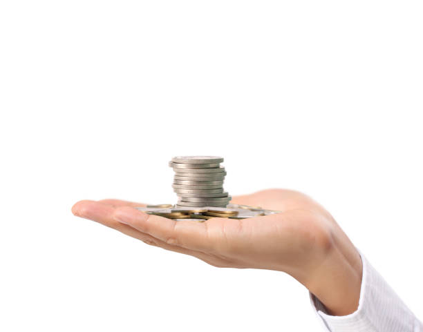 istock Hand human hand putting coin to money 864463938