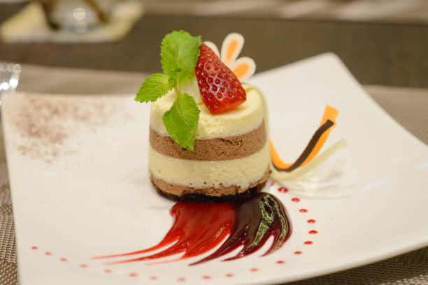 istock Black and white chocolate mousse with strawberry compote 864464022