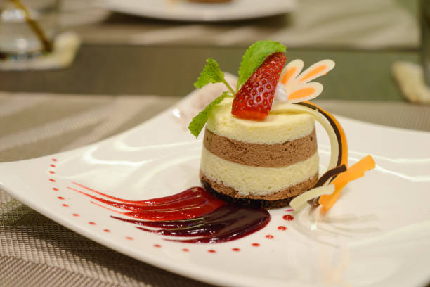 istock Black and white chocolate mousse with strawberry compote 864464104