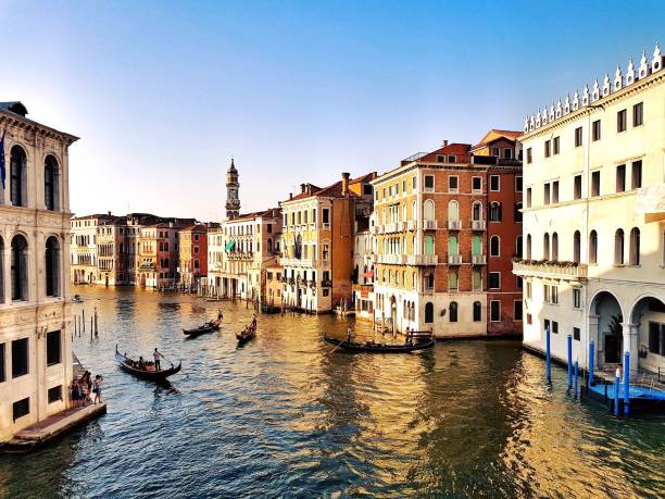 istock Gondolas in grand canal of Venice 864464664