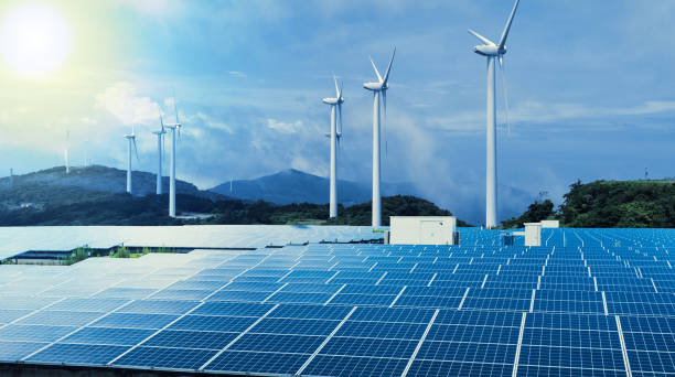 istock renewable energy conceptual visual. wind power plant and solar power plant. 864464710