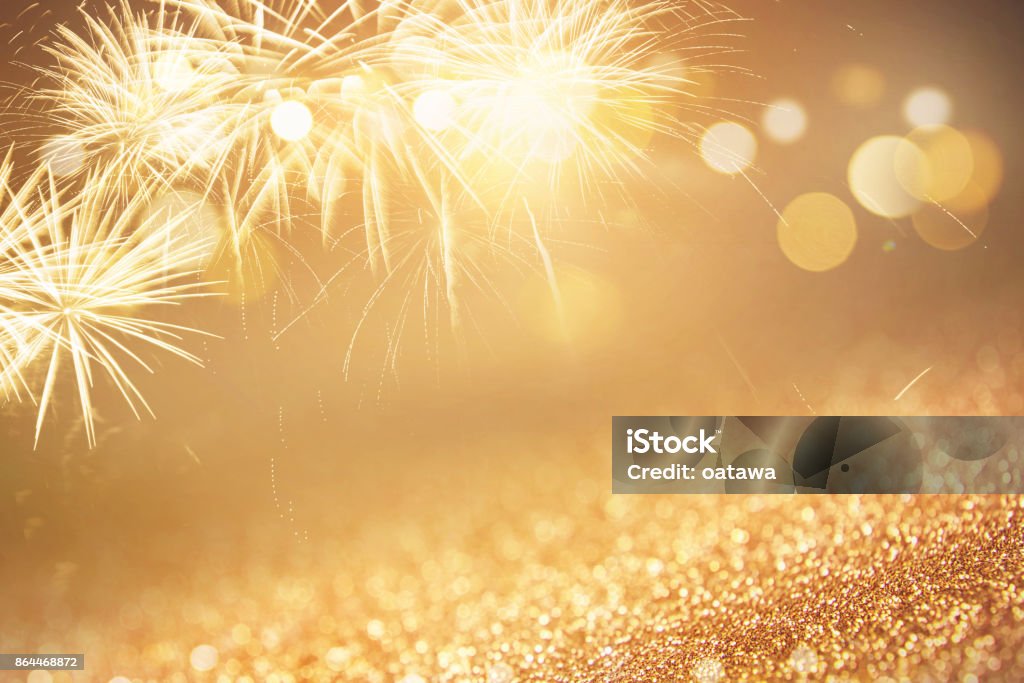 Background Fireworks at New Year Holiday Holiday Red and Gold Fireworks and bokeh in New Year eve and copy space. Abstract background celebration. Backgrounds Stock Photo