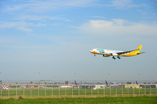 Bangkok, Thailand - July 30, 2017:  Cebu Pacific Air RP-C3344 Airbus plane landing to runways at suvarnabhumi international airport in Bangkok ,Thailand. This airport is one of the most populated airports in the world.
