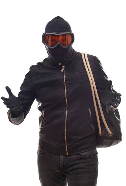 istock Dangerous burglar in black 864473222