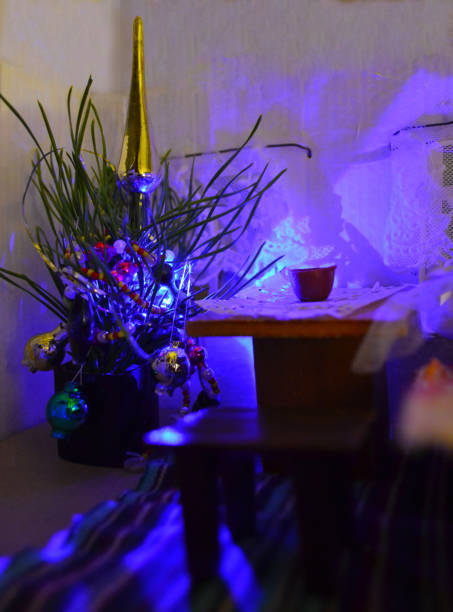 istock Christmas tree in the night room 864478728