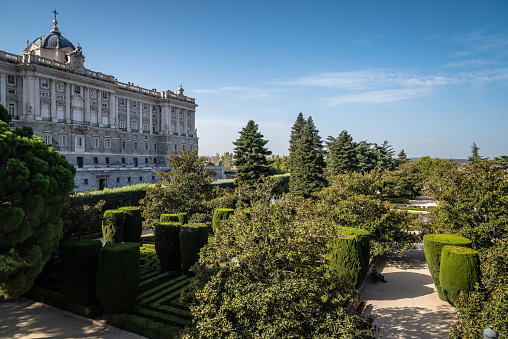 Madrid, Spain - October 15, 2017: Sabatini Gardens and Royal Palace of Madrid. The Sabatini Gardens are part of the Royal Palace in Madrid, Spain .