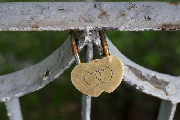 Wedding love lock on fence stock photo