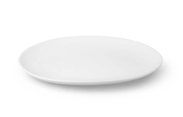 istock Round plate or dishe isolated on white with clipping path 864481784