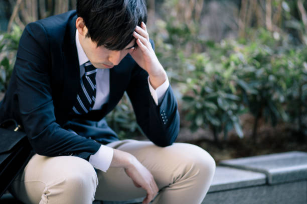 istock depressed businessperson 864486002