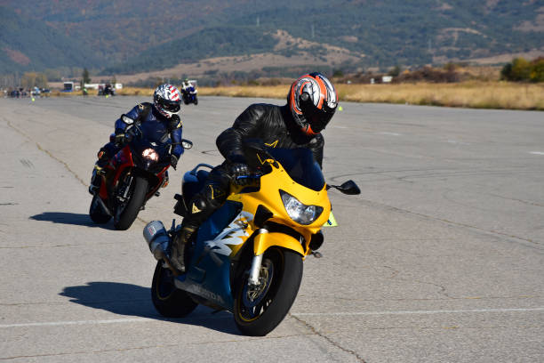 Motor bikers in action stock photo