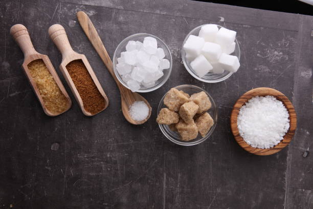 istock Various types of sugar, brown sugar and white 864488192
