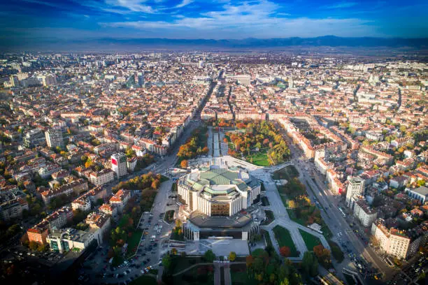 Amazing wide aerial drone shot of national palace of culture in Sofia city downtown in autumn.  The shot was taken near sunset with DJI Phantom 4 Pro drone / quadcopter.