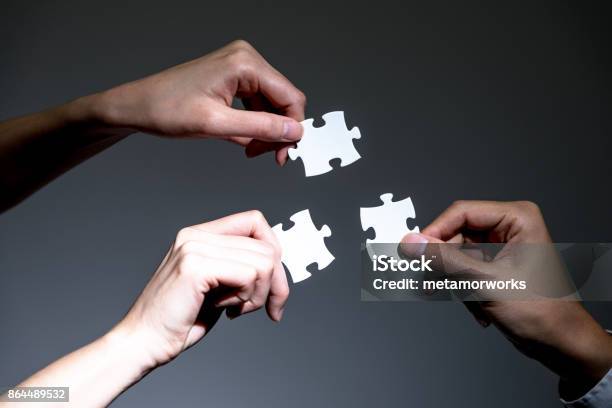 Hands Holding Jigsaw Puzzles Business To Business Business Matching Concept Stock Photo - Download Image Now