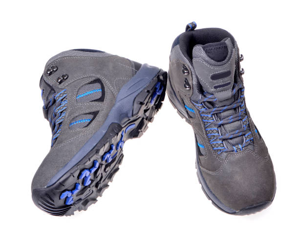 istock Men's hiking shoes on an isolated 864490540
