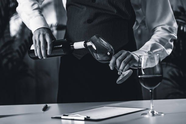 Pouring red wine from bottle