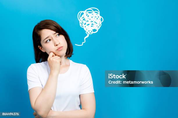 Unsatisfying Woman Stock Photo - Download Image Now - Worried, Confusion, Women