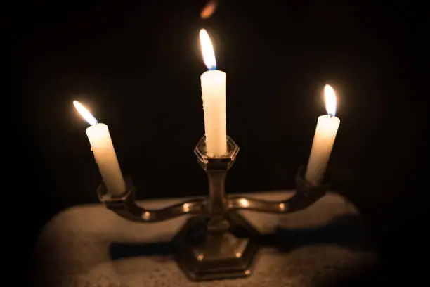 Antique candleholder in the night