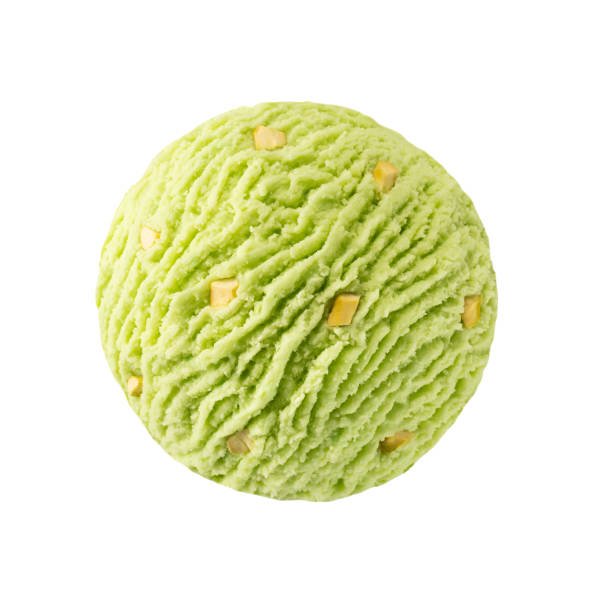 Pistachio ice cream scoop with pistachio nuts pieces Green pistacchio kiwi sorbet ice-cream ball with nuts maclura pomifera stock pictures, royalty-free photos & images