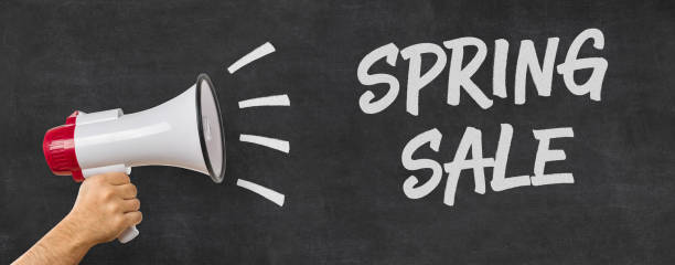 istock A man holding a megaphone - Spring Sale 864497250