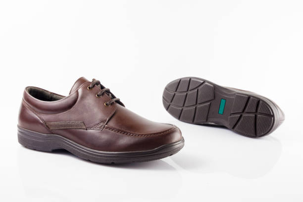 istock Male brown leather shoe on white background 864497362