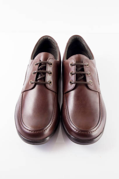 istock Male brown leather shoe on white background 864497774