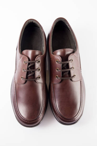 istock Male brown leather shoe on white background 864498902