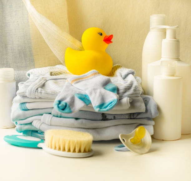istock rubber duck with baby accessories for hygiene and for bathing.On light background.Maternal concept. 864501226