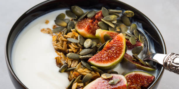 istock Healthy breakfast yogurt bowl with granola and fig 864502196