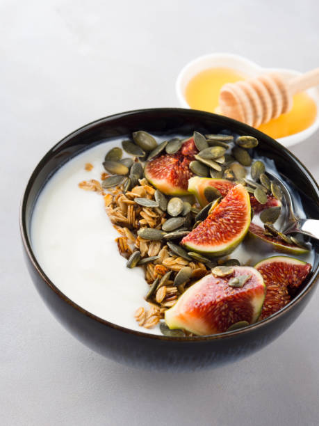 istock Healthy breakfast yogurt bowl with granola and fig 864502268