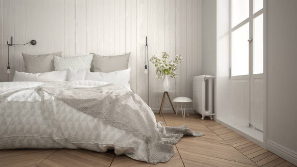 istock Scandinavian minimalist bedroom with big window and herringbone parquet, white interior design, close-up 864504448