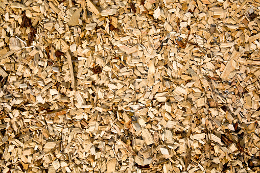 Background with beige and brown wood chips