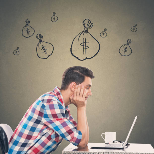 istock Upset businessman working on laptop 864506494