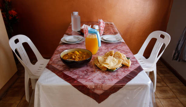Food table for two dinner sitting cooking cloth chairs restaurant